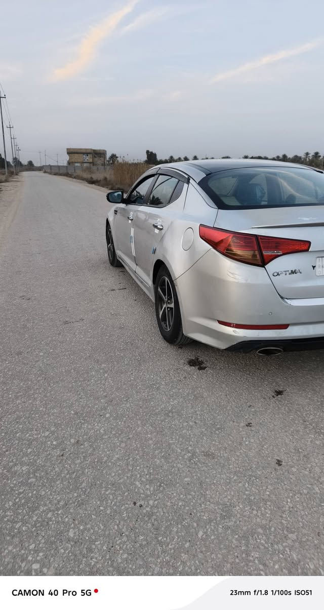 سلام عليكم كيه اوبتما 2013 وارد كوري سياره جديده مصبوغه حزام سياره جاهزه مكينه كير حداديه تخم تاير داخل كله جديد تبريد شغال سياره ستخدام شخصي فقط رقم بغداد جديد بسمنه الستفسار علا رقم ((***********))  ((***********)) والي ياخذها يدك سونار   مكينه 2000دوش مكاني حله سعر 95وبيها مجال
