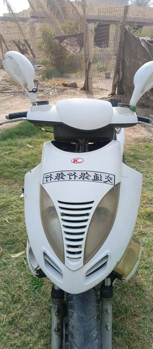 السلام عليكم دراجه كامكو للبيع نقصها بس كابريته دراجه نضيفه السعر 400وبيها مجال  رقمي *********** المكان بابل المحاويل
