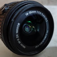 عدسة ١٨.٥٥ • نيكون DX • توصيل كافة المحافظات