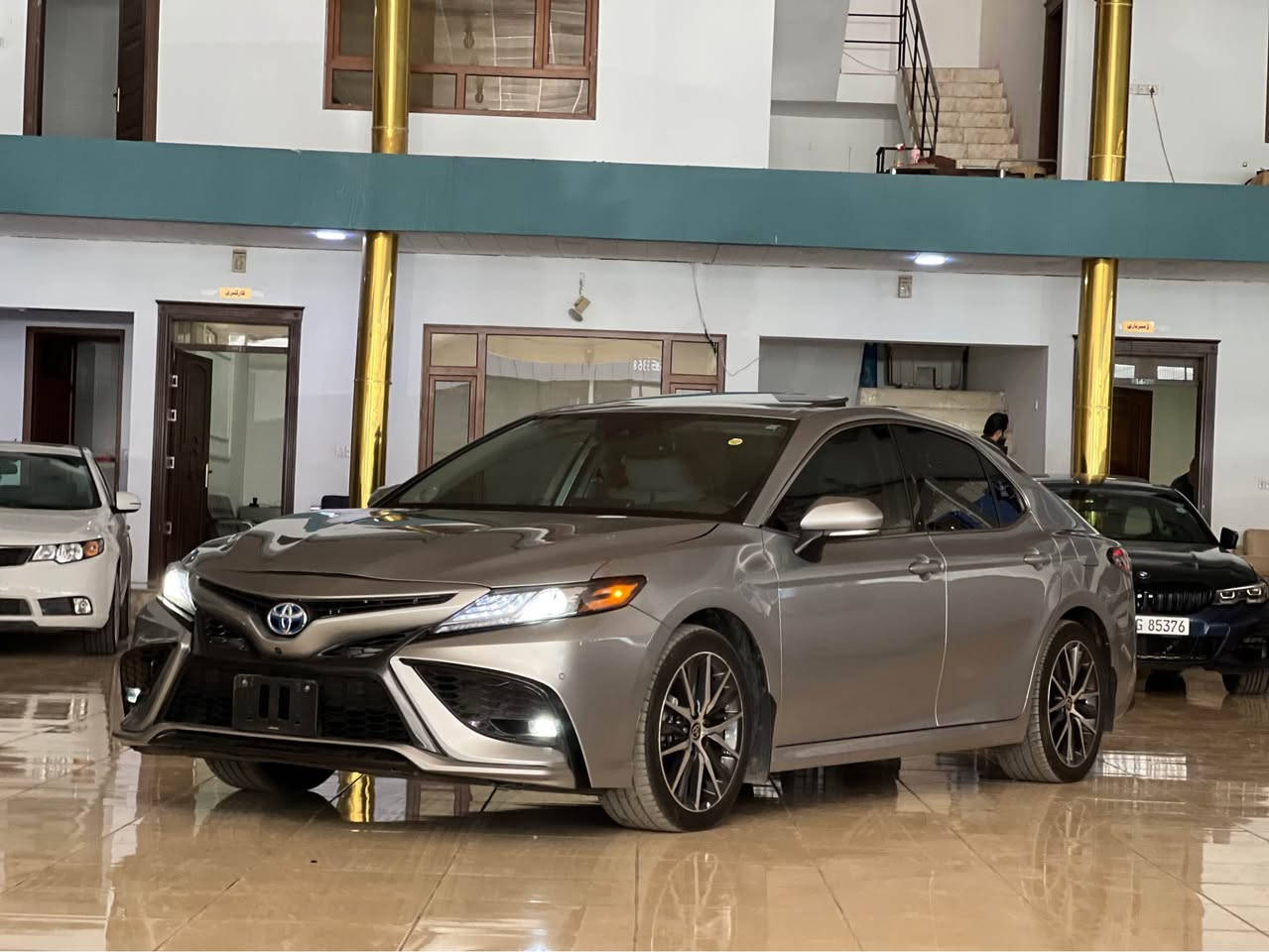 TOYOTA CAMRY 2024 XLE HYBRID  💙￼
تيوتا كامري 2024 XLE هايبرد فول فول مواصفات 🩶
بصمه ⚫️
شاشه كبير JBL 🖥️
فتحه ( سلايت )
٥ كامره 
‏داتاشو 
كشن جلد
كشن كهرباي 
كشن حار 🔥و بارد 🥶
بابين بصمه 
لايت LED
و بعد مواصفات هوايه 
‏ملاحظة : سياره بدون صبغ بدون دواخل بدون ولا ارباك فقط راس بنيد شويه تعديل بارد 
مكان سياره اربيل شارع ١٠٠ م 
واتساب :: ***********￼ اكر, نينوى
