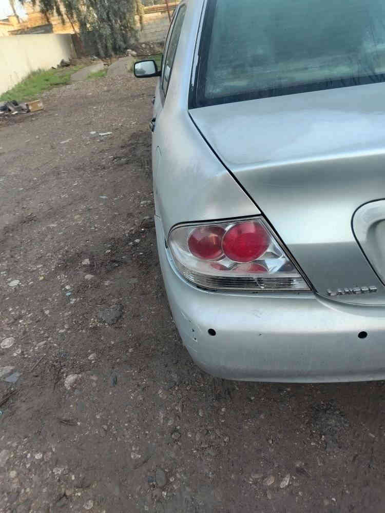 سيارة لانسر بغداد رقم نكليزي سنوية ٢٩ مكينه ٢٠٠٠  موديل ٢٠٠٦ سيارة خير من الله سيارة بلاديه جارده بسمي مابيها اي نقص بس بك لايت مكسور ودعاميه الخلفيه يراد تطبيك حداديات كامله سعر ٦٣ وبيه مجال حك جيه رقم ***********
