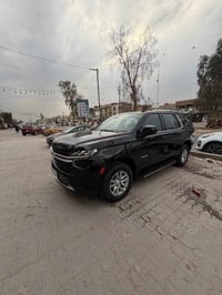 تاهو خليجي رقم بغداد باسمي موديل lS2023 ماشية 61معروفه مواصفاتها  مكفو...