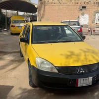 لانسر ٢٠١٠ • باب السايق مبدل • ديوانية