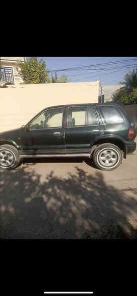 سياره اسبورتج موديل 93تشتغل عل كاز (تبريد) رقم انكليزي السنويه لغايه 2029بها خيط تبخير جام ومرايا كهربائيّ ***********/السعر ٣٣وبيه مجال السياره  بسمي
