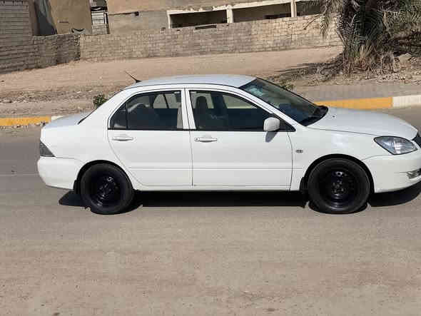 السلام عليكم لانسر 2011 رقم بغداد كير محرك صدر تخم تاير جديد  السياره جاهزه سنويه 30 تبريد تدفئه شغال  السونار مرفق بلمنشور السعر 86 وبيه مجال قليل الرقم ***********
