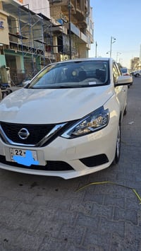 نيسان سنترا  مديل ٢٠٢٥  رقم اربيل  باسمي شرط الامداور سياره جديده ماشي...