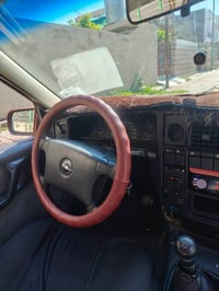 للبيع اوبل اوميكا موديل1992 حجم 20 ألون  احمر ماروني سياره على وضع الش...