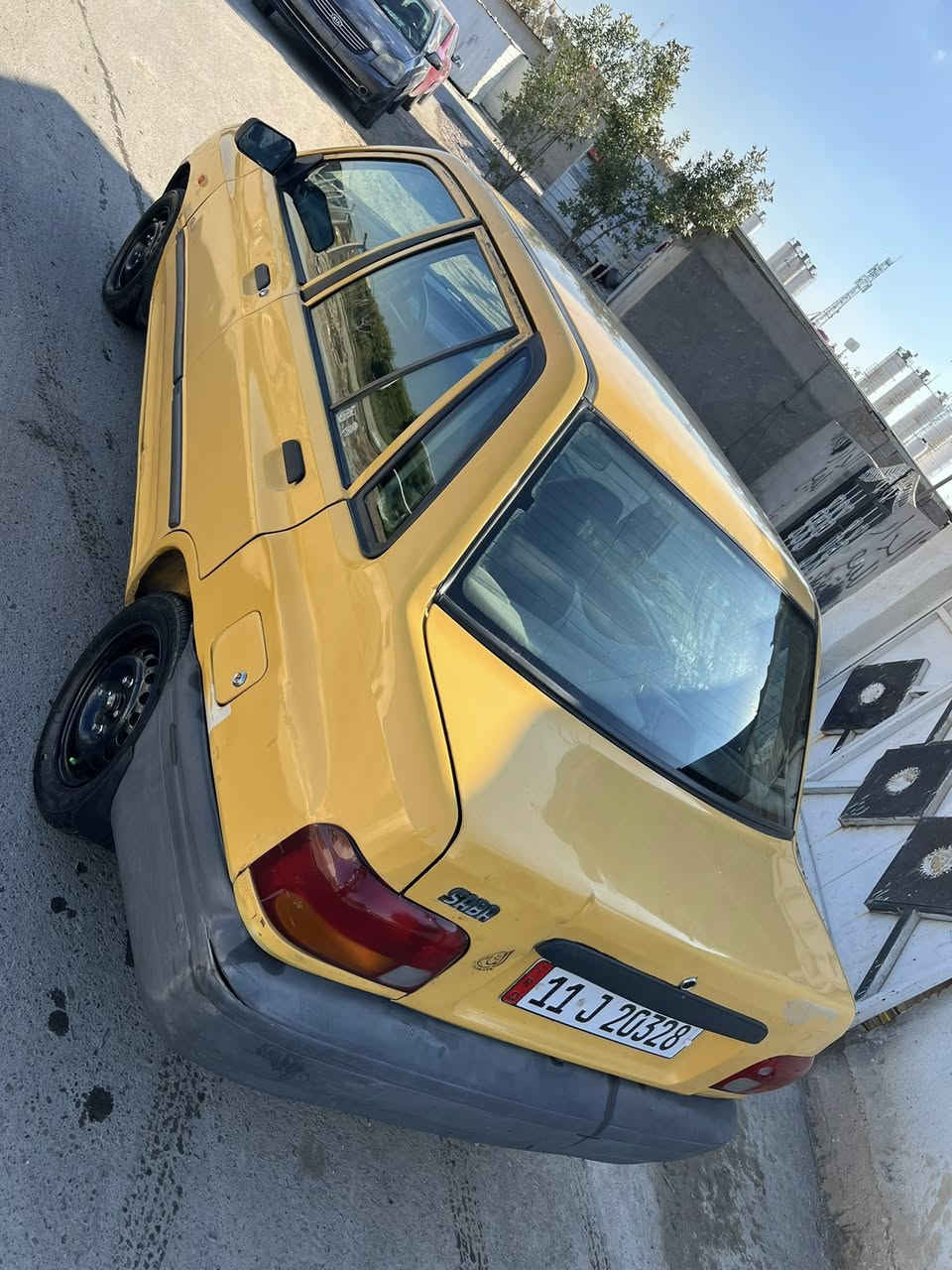 السلام عليكم سايبه مديل كير مكينه خير من الله شوااصي نضاف  صدر امامي خلفي تخم تاير كهربائيات شغاله سياره متعوب عليهه هيه غرامه مصفره  السعر ٢٦وبيهه مجال بصيط العنوان التاجيات قرب المرور الهاتف ***********
