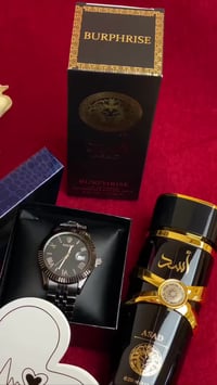 بوكس هدايا • ساعة رولكس • عطر أسد