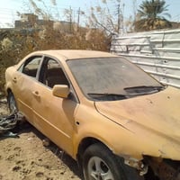 مازدا 2006 رقم ذي قار  مكينه وكير كورله 1800 مكفولات السعر 10 اوراق ات...