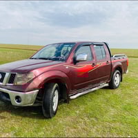 نيسان ناڤارا • ٢٠٠٩ • گير عادي