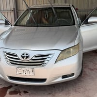 كامري 2008 رقم بغداد 6سلندر  بيها صبغ حزام  ضربتها جاملغ وباب خلفي مكي...