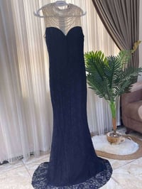 فستان • أبيض • ملبوسه مرة وحدة