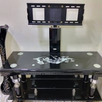 ميز تلفزيون جديد سعر ٤٠  الف استفسار ٠٧٥٠٧٠٦٨٧٨٨او٠٧٨٤٧٠١١٥٨٤