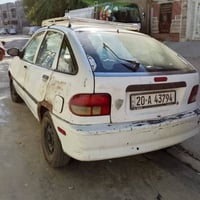 كيا افيلا • كيا • سيارة كيا • رقم انجليزي • بغداد • سيارة مستعملة