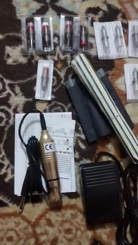 جهاز وشم • تاتو