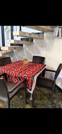 ميز و٤ كراسي • نايلون ثقيل • حي الاعلام