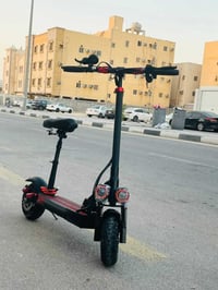 سكوتر كهربائي • شبه جديد • بطارية قوية