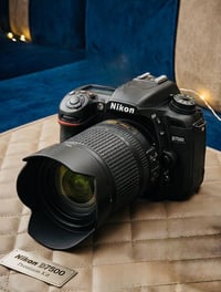 كامره نيكون7500مع عدسته البيع شتر31 07738873828