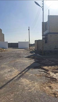 قطعه ارض للبيع 200 متر قرب مجمع العرين الشهداء بناء خير نفس موقع الصور...