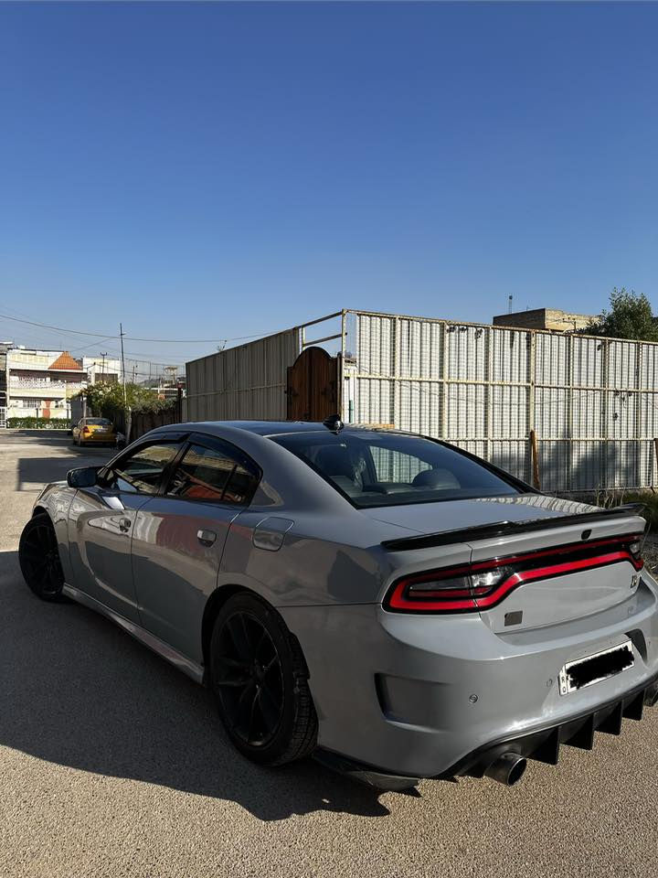 سلام عليكم من رخصه الادمن  (كلشي كتبت بالمنشور )
للمراوس 

جارجر SRT سكات باك 

مكينه 6.4 

السياره كير مكينه صدر كله جديد 

السياره جاهزه من كل النواحي 

حادثها جاملغات خلفيه فقط بدون اي شي 

يعني حوض مكفول 

بس جاملغات خلفيه (يعني حوضها مابي شي حادثها صاير من فوك)

مبدلين جاملغات خلفيه بس جاملغات بدون اي دواخل 

مغيرين لونها من فيلي غامق الى اسمنتي 

السياره مال جناي 

جك انجن ما مشتغل بيها اي كبوب ما مشتغل بيها 

جاهزه جدآ 

السياره مصروف عليها فوك ال 30 ورقه 

السياره حته اكزوزها بلادي ما ملعوب بيها ابد

ماشيه 81 الف كيلو متر بس 

والسياره مداريها زيت يورول و بانزين محسن 

السعر 165 

(مراوس فقط ) 

***********
