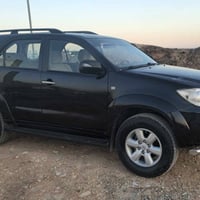 فورتنر ٢٠١١ • أسود • رقم اربيل