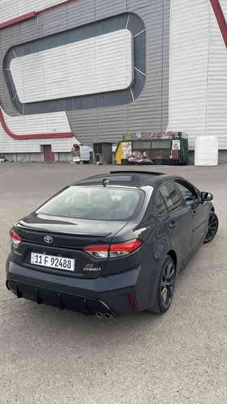 سلام عليكم 
❗️ للبيع فقط ❗️
السيارة دخول جديد اني المستورد تصليح على ايدي شغل مضبوط مال جناي رقم بغداد باسمي  
⭕️ تيوتا كورلا 2024 هايبرد ( بانزين + كهرباء ) Awd 
الفئة se نايت شيد فول لون اسمنتي الجديد و المواصفات : 
بصمة 
فتحة 
شاشة كبيرة 
داخل لونين ابيض واسود  
حساسات 
رادار امامي
رادار جانبي
كامرة تحديد مسار
كروز سرعة 
لايت امامي ليد + عدسة 
شاحن وايرليس
اوتو هولد 
سايد بريك بصمة
كامرة خلفية 
3 وضعيات قيادة 
كار بلي 
اشاير بالمري
 ويل 18 
كشنات مخمل
تخم تاير جديد
البطارية بحالة الوكالة 
الصدر امامي خلفي بحالة الوكالة 
ماشية 30 الف 
⭕️ الحادث : 
باب خلفي وهلال الجاملغ الخلفي 
صبغ الباب ونص الجاملغ 
ايرباك بردة وكشن راجع سستم 
 السعر وصور الحادث تفضل خاص او اتصل 
*********** 
العنوان بغداد - الامين الثانية
