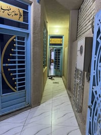 وبركاته  بيت للبيع  في كربلاء في حي القد س 100متر خلف بترومين  قرب مدر...