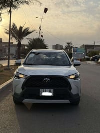 كورلا كروز 2024 ماشية 16 الف  داخل احمر  كشن كهربائي  بيهة فقط طخه بسي...