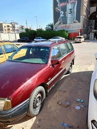 سيارة اوبل اميكا ستيشن لون احمر خمري موديل 1990 كفر جديد مابيهة ولا طخ...