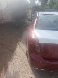 سيارة فورنزة اوبترا  موديل 2008 محرك 2000 رقم بغداد  تفاصيل جميع ع الخ...