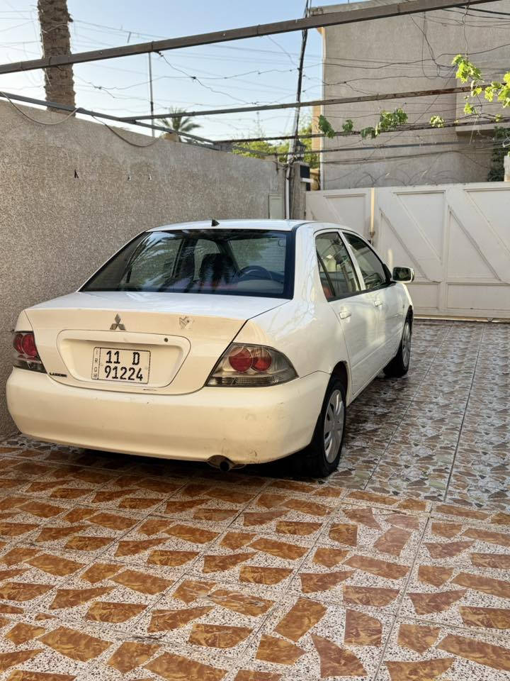 سلام عليكم
لانسر للبيع موديل 2011 
بيه 3 قطع تبديل فقط 
محرك 1500 قبق اسود 
رقم بغداد الجديد هزه وسنويه جدد 
السعر 75 وبيه مجال 
للستفسار ***********
 مكان ديالى
