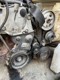 نجف • محرك • حاوية