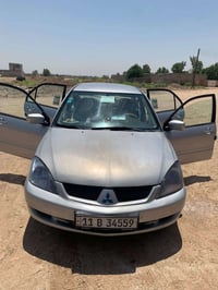 لانسر بومه موديل 2007 لون سلفر محرك 1500 كير اوتوماتيك الظرر مبين بالس...