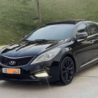 ازيرا ٢٠١٢ • محرك ٦ • جلد قرميدي