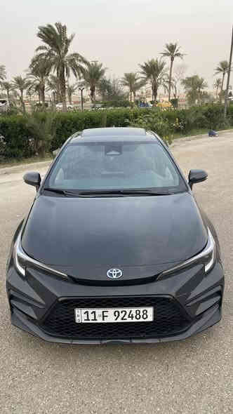 سلام عليكم 
❗️ للبيع فقط ❗️
السيارة دخول جديد اني المستورد تصليح على ايدي شغل مضبوط مال جناي رقم بغداد باسمي  
⭕️ تيوتا كورلا 2024 هايبرد ( بانزين + كهرباء ) Awd 
الفئة se نايت شيد فول لون اسمنتي الجديد و المواصفات : 
بصمة 
فتحة 
شاشة كبيرة 
داخل لونين ابيض واسود  
حساسات 
رادار امامي
رادار جانبي
كامرة تحديد مسار
كروز سرعة 
لايت امامي ليد + عدسة 
شاحن وايرليس
اوتو هولد 
سايد بريك بصمة
كامرة خلفية 
3 وضعيات قيادة 
كار بلي 
اشاير بالمري
 ويل 18 
كشنات مخمل
تخم تاير جديد
البطارية بحالة الوكالة 
الصدر امامي خلفي بحالة الوكالة 
ماشية 30 الف 
⭕️ الحادث : 
باب خلفي وهلال الجاملغ الخلفي 
صبغ الباب ونص الجاملغ 
ايرباك بردة وكشن راجع سستم 
 السعر وصور الحادث تفضل خاص او اتصل 
*********** 
العنوان بغداد - الامين الثانية
