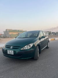 307 ٢٠٠٥ • رقم انكليزي • بدون صبغ