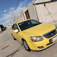 كيا سبكتراه اللبيع موديل2009 رقم نينوى محرك 20 محرك كير شراط هيه وقرام...