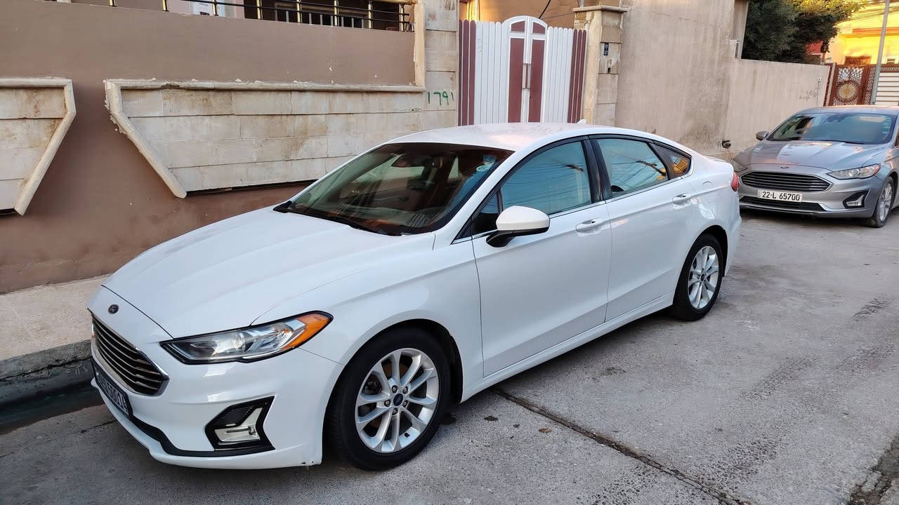 فورد فيوجن 2019  Se فول مواصفات
1500 سي سي توربو
اللون أبيض ثلجي ( لا صدفي ولا اوف وايت) 
تك اكسل المرغوب
لايتات زينون أصلي أبو الضمان
لايتات اوتو و ذكية 
بلوجكتر لد led
داخل أسود
رادار جانبي و خطوط الشارع 

٣ شاشات
شاشة sync 3.4 محدثة آخر اصدار مع برمجة ثيمات و تشغيل فيديوات Mp4
حساسات خلفية
كشن السايق و السكن كهرباء  ١٢ وضعية

مري تعتيم  
ويل 18 نظيف حيل
تبريد لمس  
ماشية 113 الف كيلو متر
كير محرك تبريد كلشي بشرط الفحص والسونار

ضررها بسيط جداً:  بيها صبغ شوية بالچنطة (بالصندوگ) و شبر  يم اللايت الخلفي (بدون دواخل بدون ايرباك). 

👈  سعرها 140 ورقة وبيها مجال  👉

***********
مكان السيارة موصل ـ الساحل الايسر

💥 ملاحظة: السيارة جديدة بمعنى الكلمة. 💥

وجاهزة من كل النواحي شرط ما بيها أي نقص💯
دهون السيارة من شركة موتل الشهيرة. 
دهن گير تم تبديله مرتين (حسب الكتالوك) من شركة موتل.
