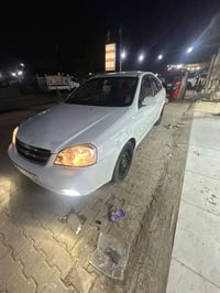 اوبتره مديل 2011سياره رقم بغداد انكليزي بسمي خير من الله كير محرك تبري...