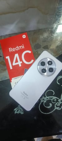 ريدمي ١٤ سي • مستعمل ٣ أيام • لوك جديد