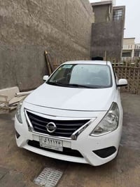 نيسان صني هندي ٢٠٢١ رقم بغداد باسمي  ماشية 70 الف حقيقي سياره برغي ماع...