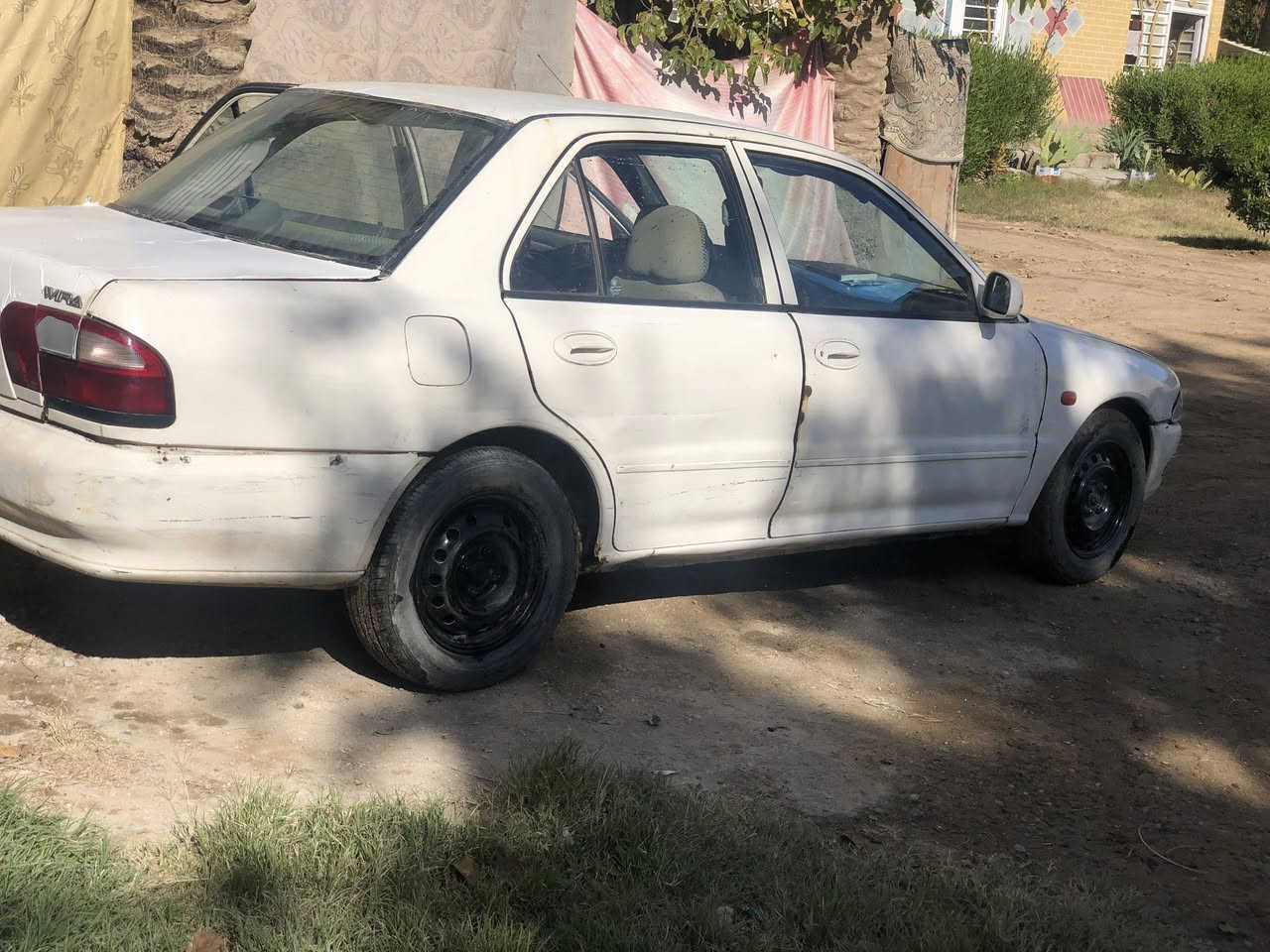 بروتون ٢٠٠٤صنع ماليزي
الكير:اتوماتيك بحاله جيده 
المكينه :بحاله جيده (كابريتر)
تدفئه وتبريد كلشي شغال بس ليك بي تبريد 
الحادث:مكفوله تكم ولغود وشواصي شركه بعده فقط صبغته تعبانه ودعاميات ايضا 
الداخل :جيد جدا 
كهربائيات كله شغاله كيجات 
الرقم بغداد دولي باسمي هزه جديده تحويل مباشر 
المكان ؛كربلاء 
السعر٣٣
للتواصل ***********
