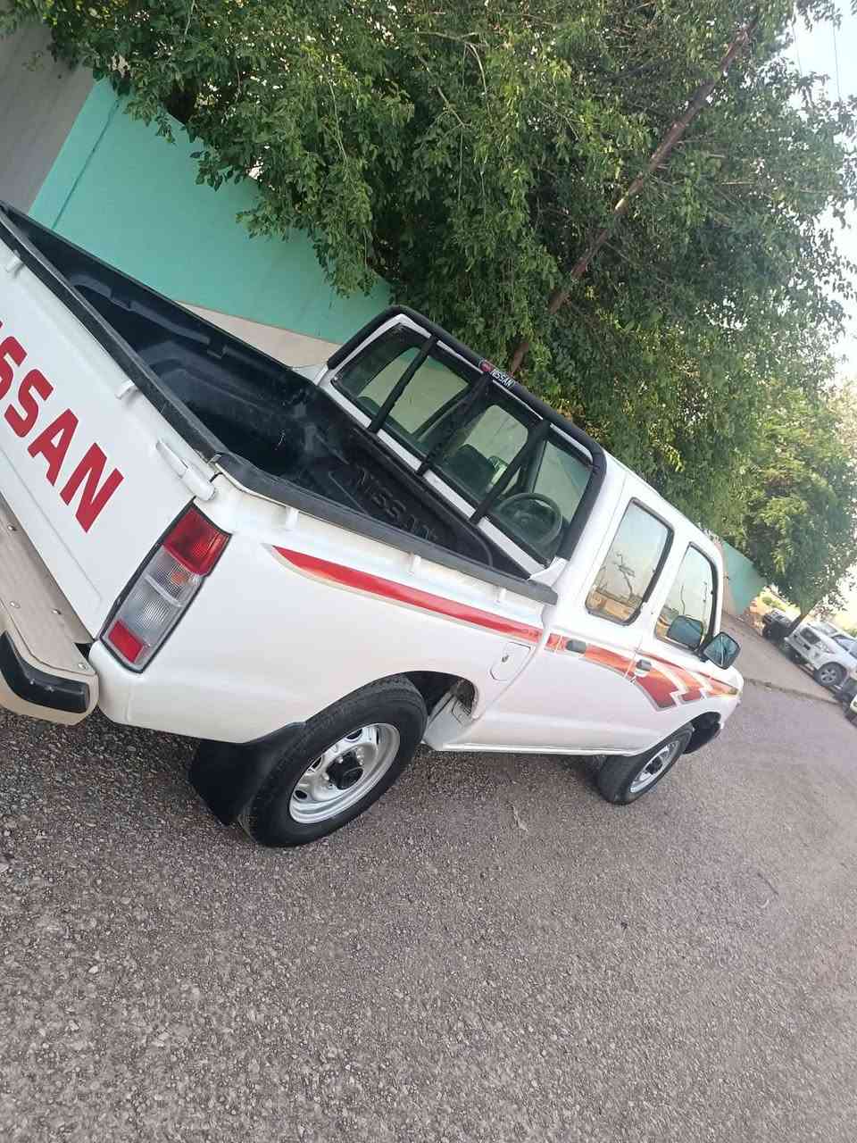 نیسان مۆدیل   2002 علوج بە شەررتی کۆد سعر    52  گەڵا  ***********           ***********
