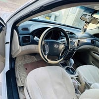 اوبتيما ٢٠٠٩ • ٢٠٠٠ سي سي • فل موصفات