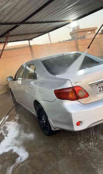 كورلا ٢٠٠٩خليجي محرك ١٨شرط كير شرط 
سنويه جديده شرط التحويل والغرامات بيها ٣قطع  اثنين تبديل تجاري وجامرلغ خلفي صبغ ومعجون***********
