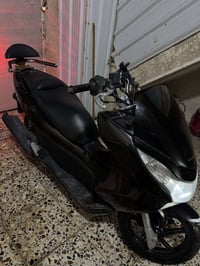 PCX جيل أول • مكينة 125 • ياباني