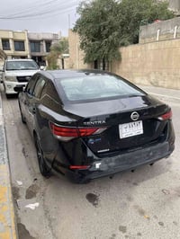 نيسان سنترا 2021  فئه sv   السياره وارد امريكي رقم بصره معوقين بعد سنه...