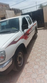 نيسان بيكم • ٢٠٠٣ • كفالة