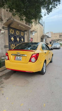 شوفرليت سونك مديل ٢٠١٣  وارد أمريكي حادثها خلفي بل حوض فقط ايرباك ستير...